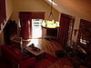 Living room (After) - Draperies and woven wood shades  East Hampton, NY